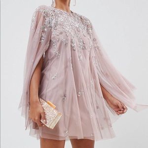 Embellished cape dress